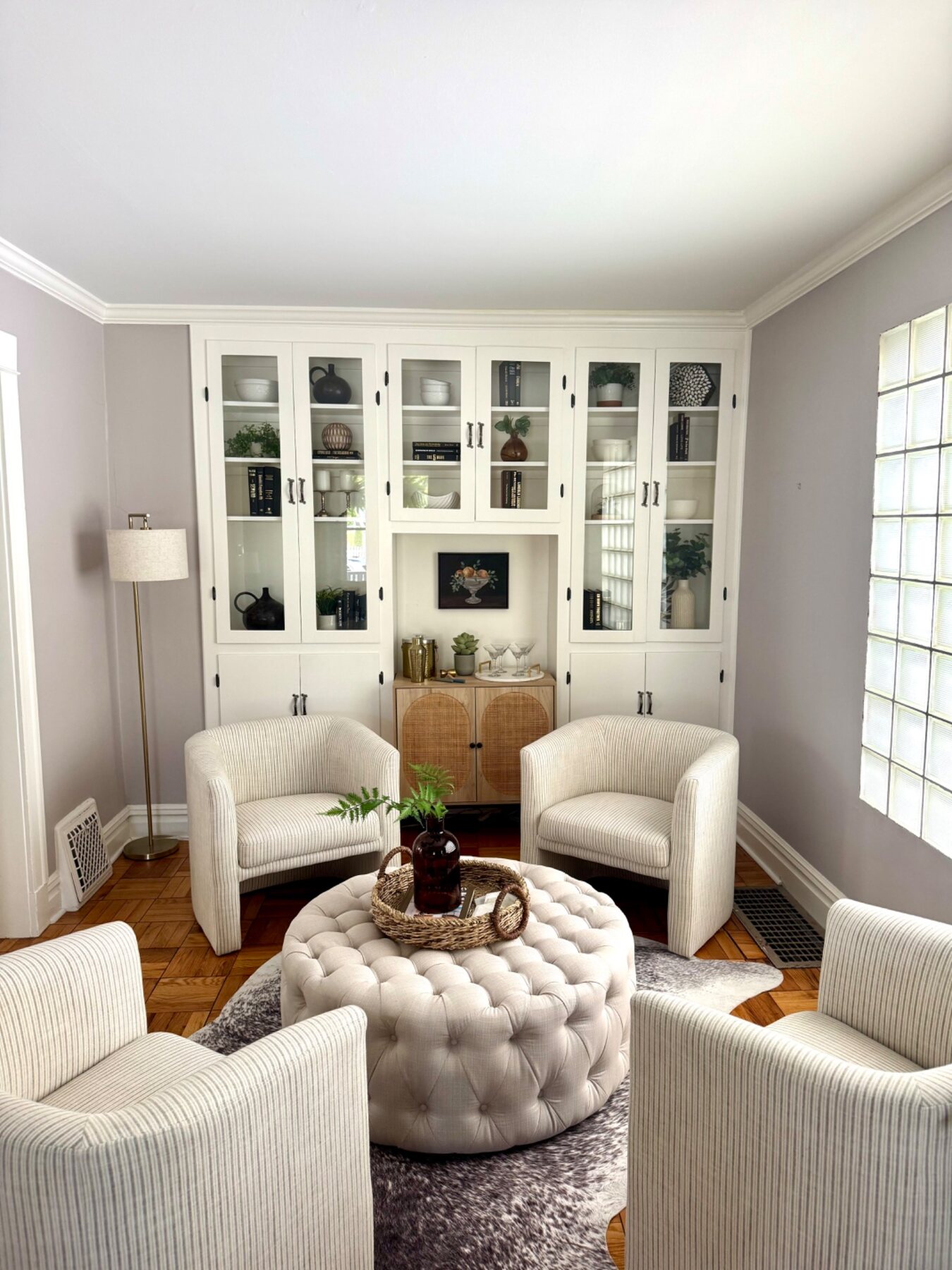 Vacant vintage Saint Joseph home on Forres Avenue staged with ivory chairs and styled built-in cabinetry